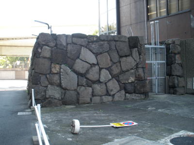 The rear side of the stone wall–like structure